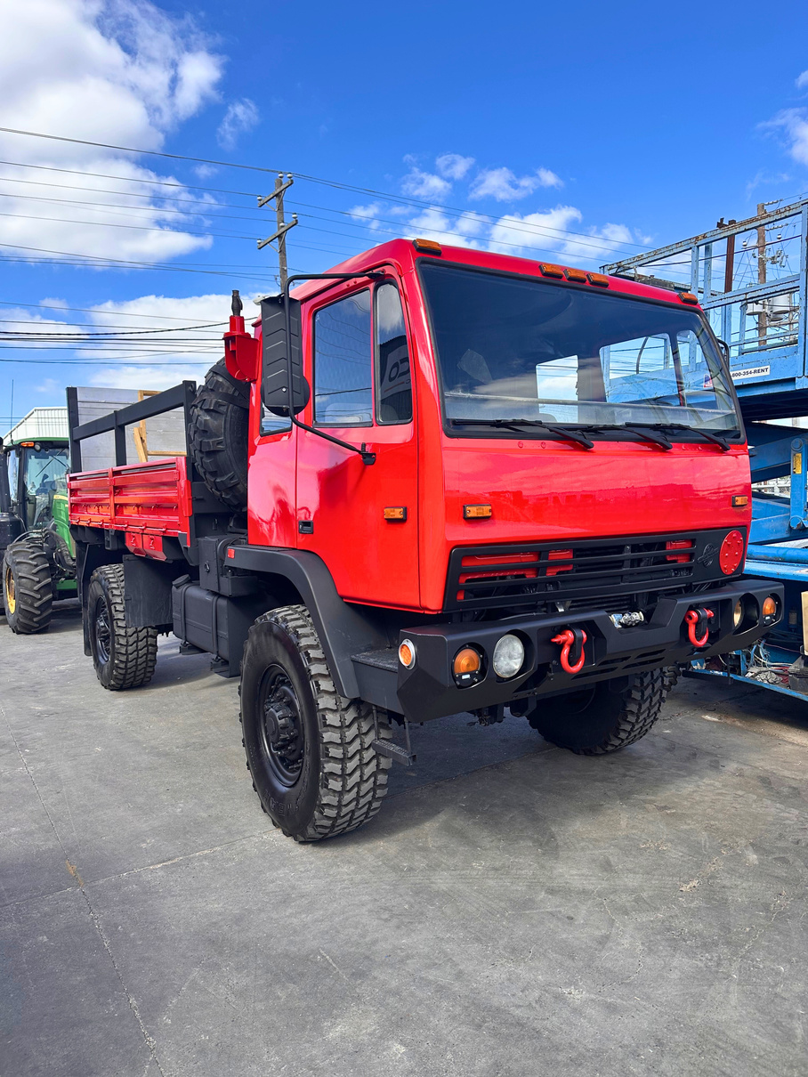 Finished red fleet truck after refinishing